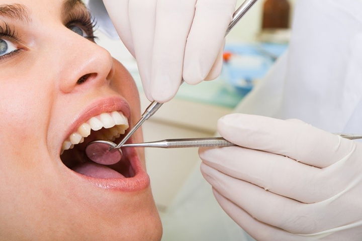 dental crown is a custom-made cap placed over a tooth to restore its shape, size, strength, and appearance.